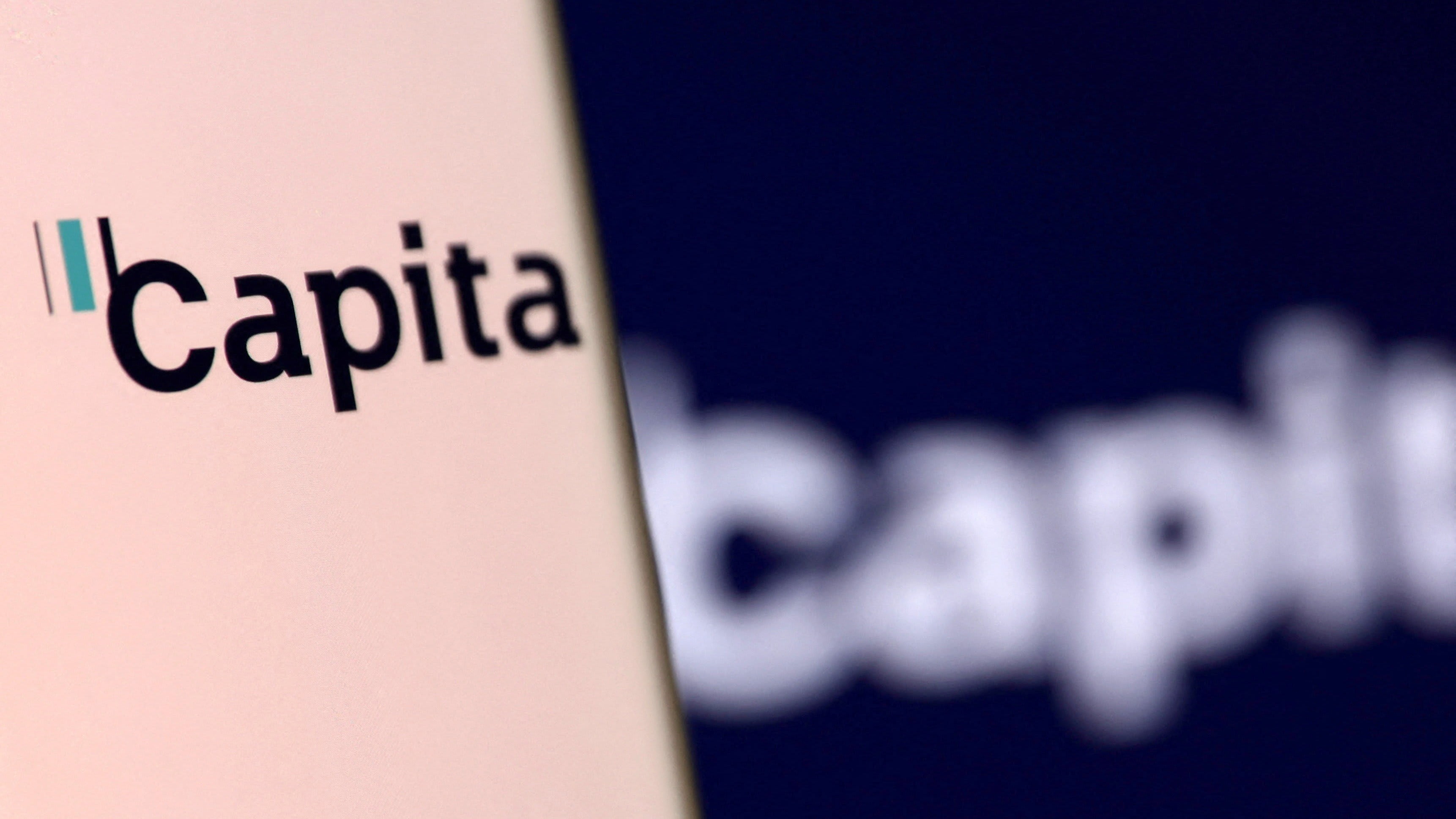 Capita operating profits hit by civil service pension costs