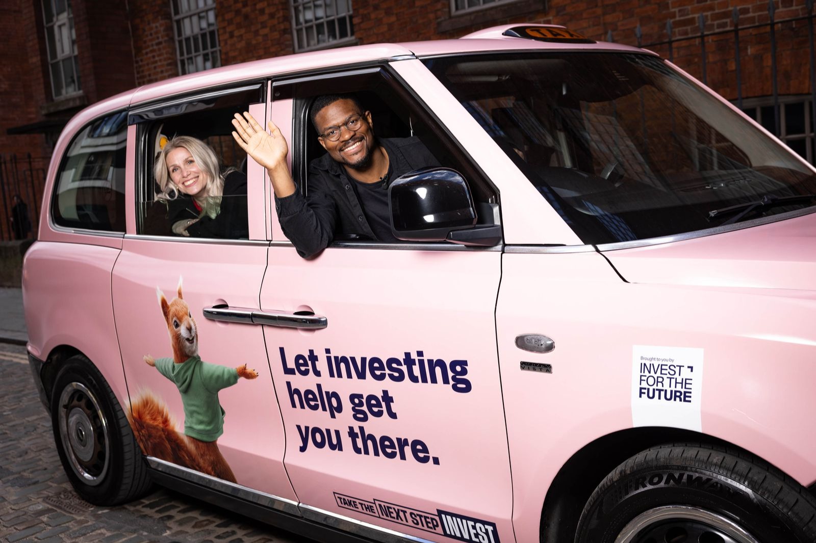 Anna Brading and Rotimi Merriman Johnson mark the launch of Savvy Cabs in Manchester