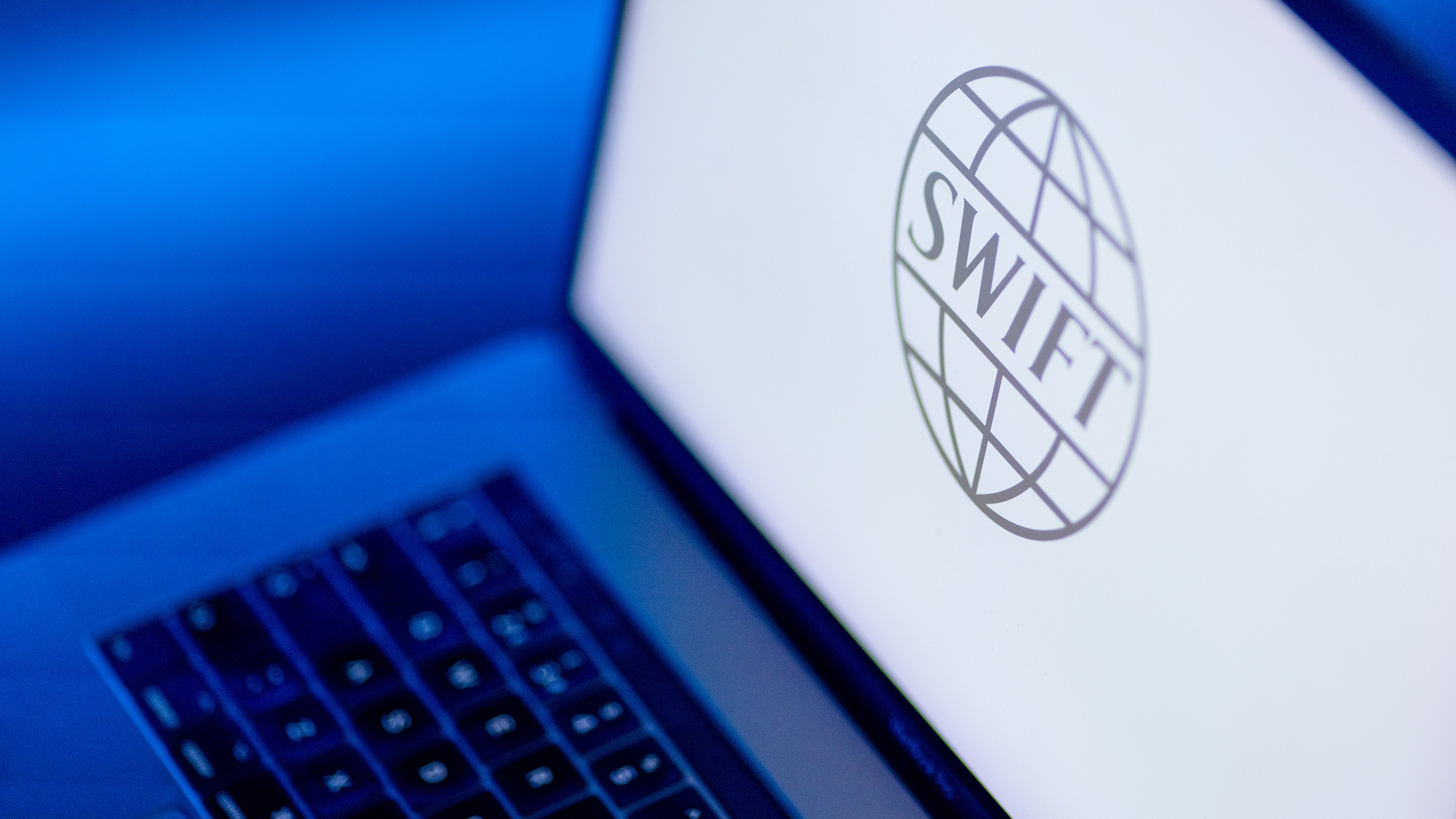 Swift responds to stablecoin surge with blockchain launch