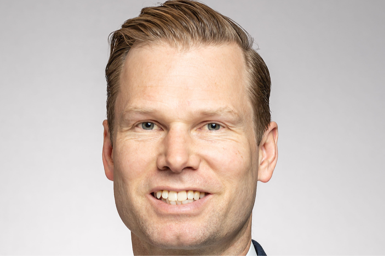 A headshot of Investec’s Carlton Nelson